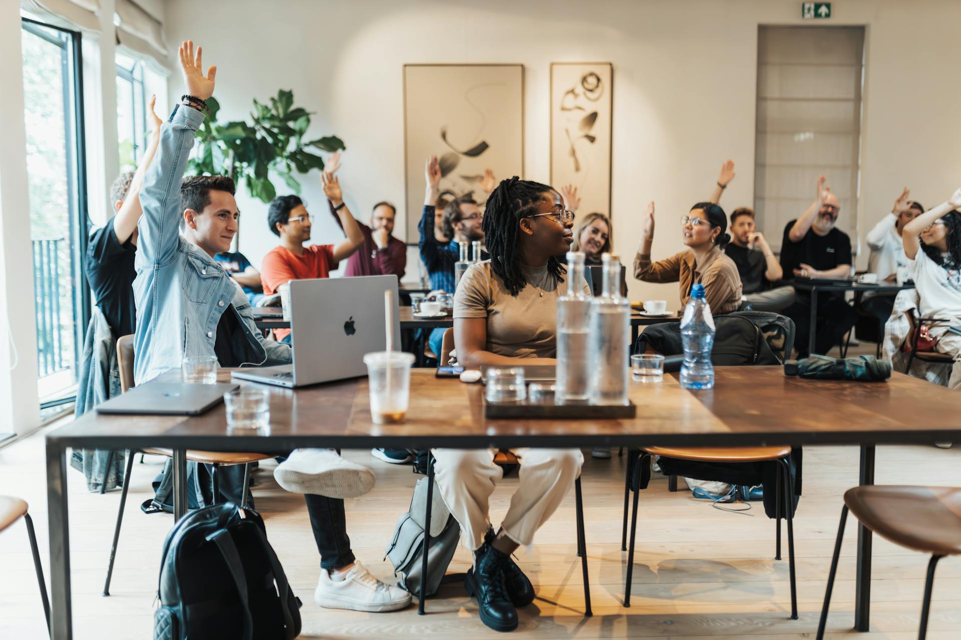 Attendees at a cybersecurity and safety workshop learning about online protection and digital threats.
